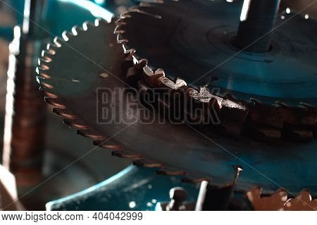 Sharp Circular Saw Blades Close Up. Dangerous Machine To Cut Up From Horror Films. This Is A Shaft F