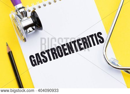 Gastroenteritis Word Write On Medical Notebook With Stethoscope.