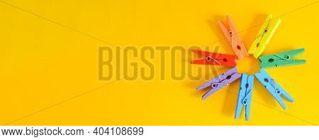 Banner Concept Of Mood-boosting Color, Multi-colored Wooden Multi-colored Clothespins In The Shape O