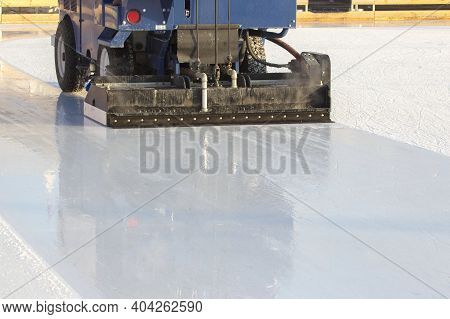 Special Machine For Cleaning Ice On An Ice Rink At Work. Transport Industry