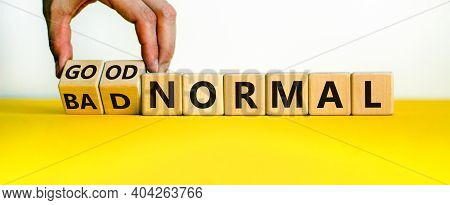 Good Or Bad Normal Symbol. Hand Turns Cubes And Changes Words 'bad Normal' To 'good Normal'. Busines