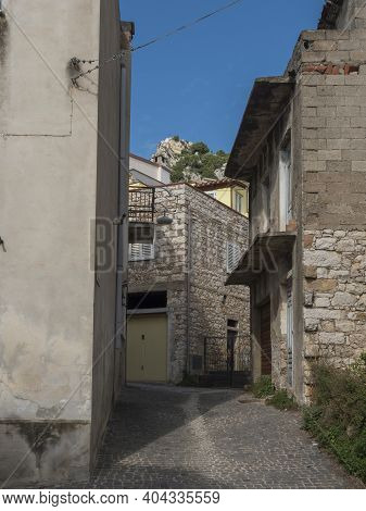 View Of Narrow Streets Of Old Romantic Mountain Village Baunei With Stone Houses. Ogliastra, Sardini