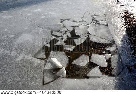 When Someone Falls Into The Frozen Water, A Hole In Icefloes Remains As One Trace Of A Drowned Man. 