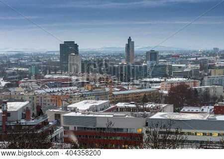 Panoramic View Of  Brno In Czech Republic. There Is A Hospital With Heliport In The Foreground. In T