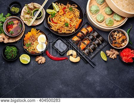 Assorted Of Different Asian Food. Chinese, Japanese And Thai Cuisine. Noodles, Dumplings Gedza, Baoz