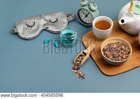 Classic Alarm Clock, Sleeping Mask, Tea Pot On Blue Pastel Background. Minimal Concept Of Rest, Qual