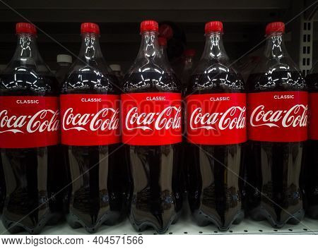 Coca-cola Carbonated Drink In Plastic Bottles On The Shelves Are For Sale In Shopping Centers On 20.