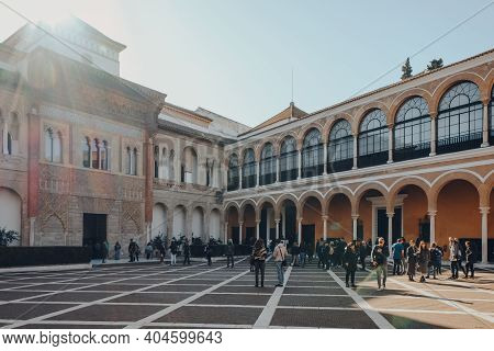 Seville, Spain - January 19, 2020: People Walking On The Patio De La Monteria In Alcazar Of Seville,