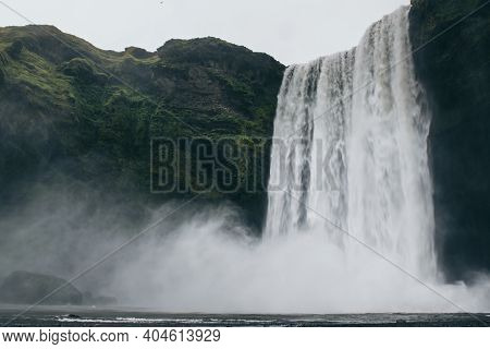 Scogafoss Waterfall In Iceland. Travel Summer Nordic Concept. Natural Icelandic Background.