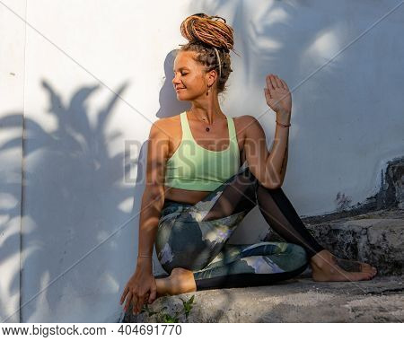 Young Woman Practicing Purna Matsyendrasana, Full Spinal Twist Pose. Flexible Spine. Body Care, Heal
