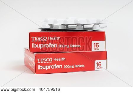 London / Uk - January 23rd 2021 - Ibuprofen Packets From Tesco Supermarket, Stacked Against A White 