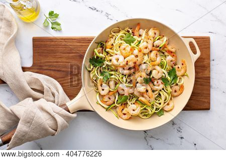 Shrimp And Zucchini Noodles Or Zoodles Pasta With Parmesan And Chili Flakes Cooked In A Cast Iron Pa