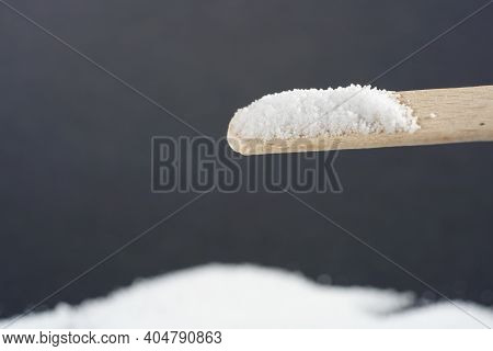 Makrogol Powder Photographed Against A Black Background In The Studio