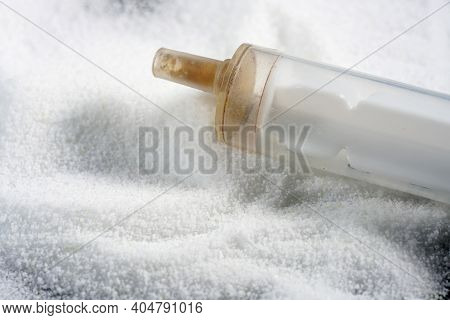 Makrogol Powder Photographed Against A Black Background In The Studio