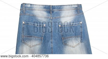 Waist And Back Pockets Part Of Light Blue Jeans With Faded White Spots. Isolated On White Background