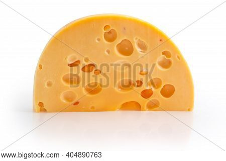Semicircular Piece Of The Swiss-type Cheese With Big Holes, So Called The Cheese's Eyes On A White B
