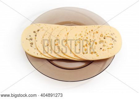 Large Thin Slices Of The Swiss-type Cheese With A Lot Of Holes, So Called The Cheese's Eyes On A Dar