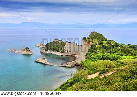 Corfu Island Landscape - Cape Drastis Coast In Greece. Ionian Sea Summer View.