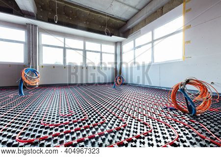 Floor heating and electrical outputs in a new building. Interior design and finishing industry. Office and apartment