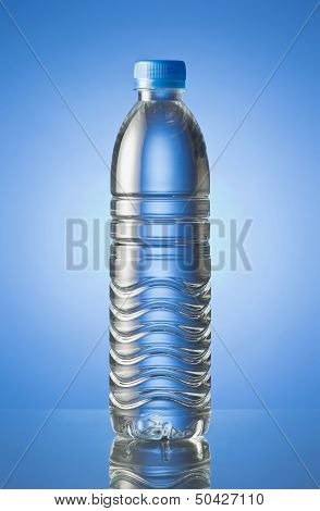 Pet Bottle of water isolated in blue background