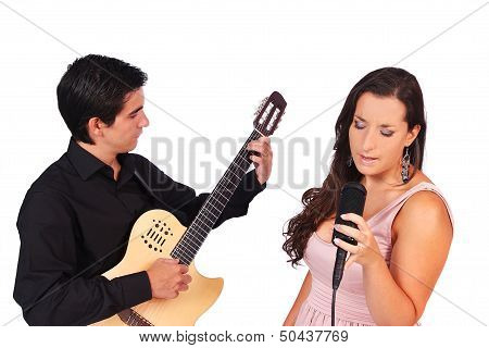 A Female Singer And A Male Guitarrist