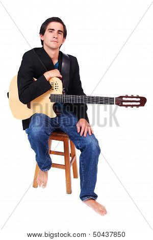 A Male Guitarrist In Action