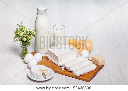 milk and food on wooden background