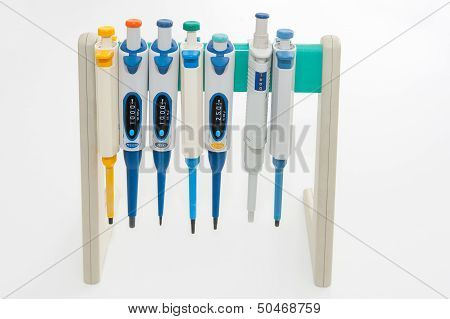 Colorful Medical Pipettes On White Background