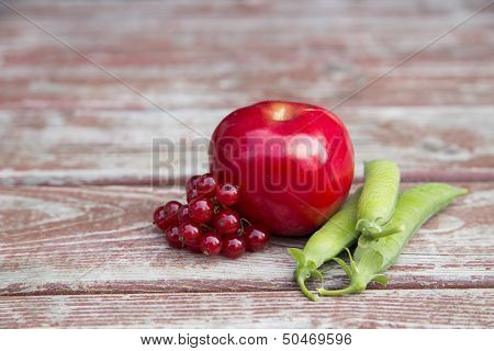 Ripe Foxberry Red Apple And Pea Pods