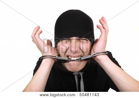 Man Gnaw His Handcuffs