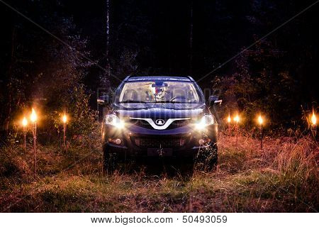 Petrozavodsk, Karelia, Russia - July 21, 2013: Holiday photo of Hover H5 which was made in Karelia in the forest at night.