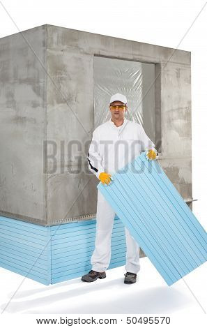 Worker Holding An Insulation Panel