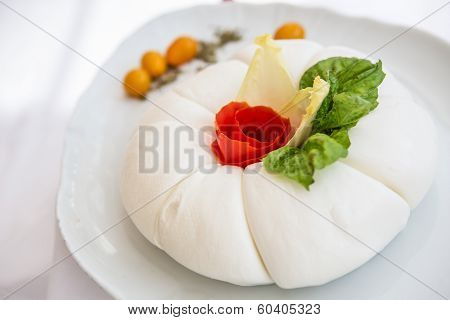 Mozzarella With Tomatos And Basil Leaves