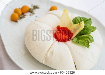 Mozzarella With Tomatos And Basil Leaves