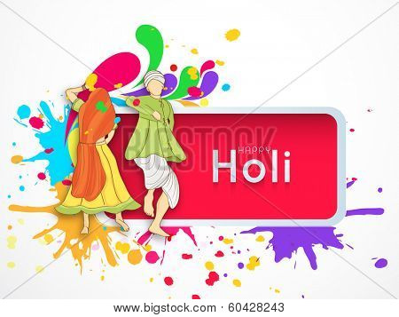 Beautiful Indian colours festival Holi concept with young couple in traditional outfits dancing and playing colours on splash background.