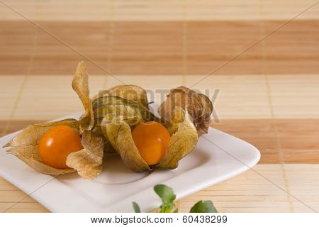 two open and two closed gooseberries