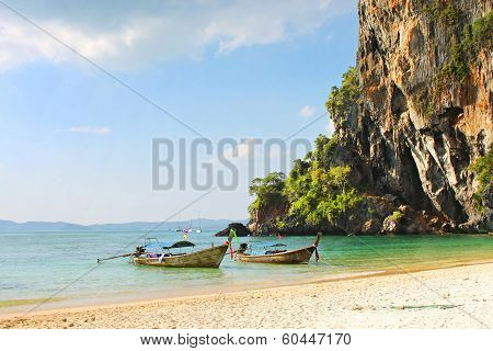 Holiday Vacation Concept Background - Long Tail Boat On Tropical Beach With Limestone Rock, Krabi