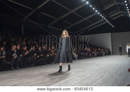 NEW YORK-FEB 8: A model walks the runway at the Jill Stuart fashion show during Mercedes-Benz Fashion Week Fall 2014 at Lincoln Center on February 8, 2014 in New York City.