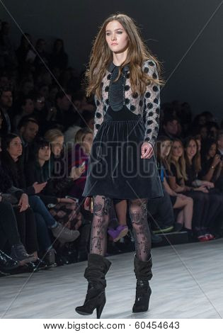 NEW YORK-FEB 8: A model walks the runway at the Jill Stuart fashion show during Mercedes-Benz Fashion Week Fall 2014 at Lincoln Center on February 8, 2014 in New York City.