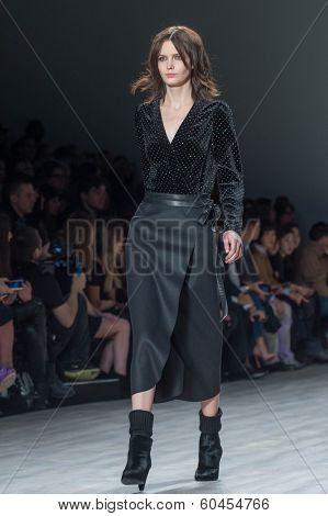 NEW YORK-FEB 8: A model walks the runway at the Jill Stuart fashion show during Mercedes-Benz Fashion Week Fall 2014 at Lincoln Center on February 8, 2014 in New York City.