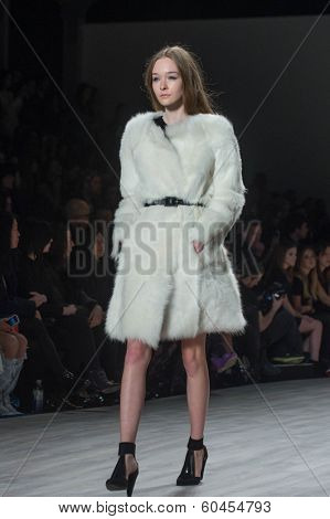 NEW YORK-FEB 8: A model walks the runway at the Jill Stuart fashion show during Mercedes-Benz Fashion Week Fall 2014 at Lincoln Center on February 8, 2014 in New York City.