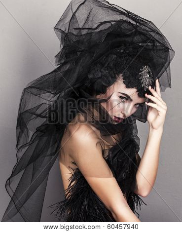 beautiful glamour model with black veil