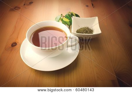 Cup of tea on wooden background