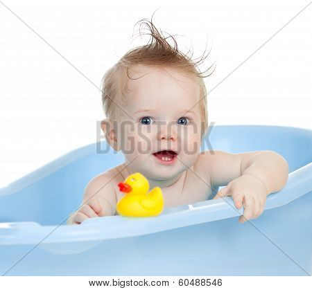 Adorable Baby Having Bath In Blue Tub