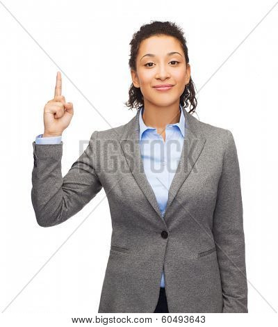 business and advertisement concept - attractive young woman with her finger up