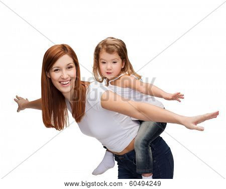 childhood and parenting concept - happy mother and child doing piggy back