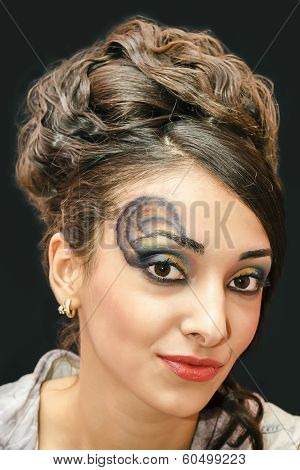 beautiful young girl with a make up .