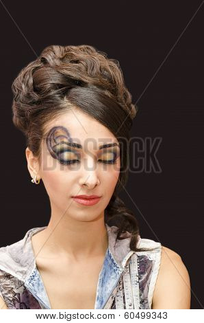 beautiful young girl with a make up .