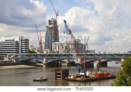 LONDON, UK - JUNE 30, 2014: New building site with cranes in Bank of England aria