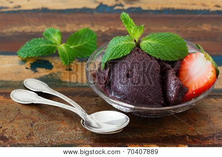 Brazilian Dessert Acai Pulp In Glass With Strawberry And Mint